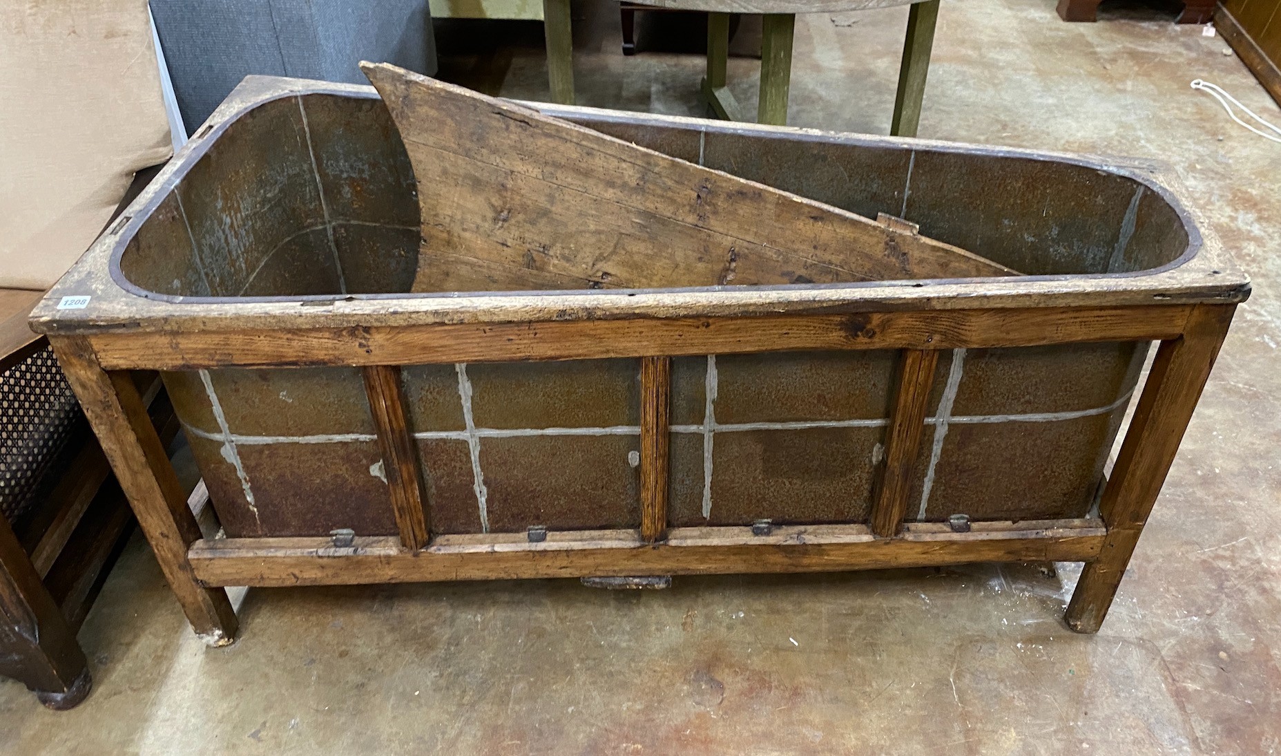 A 19th century French oak bath with zinc liner and cover, length 142cm, depth 65cm, height 64cm *Please note the sale commences at 9am.